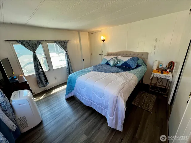 a kitchen with sink cabinets and refrigerator