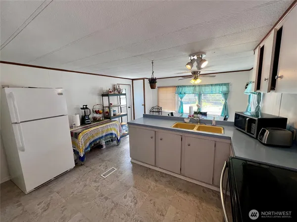 $59,000 | 8705 143rd Ave Court East, Unit 48, Puyallup, WA 98372