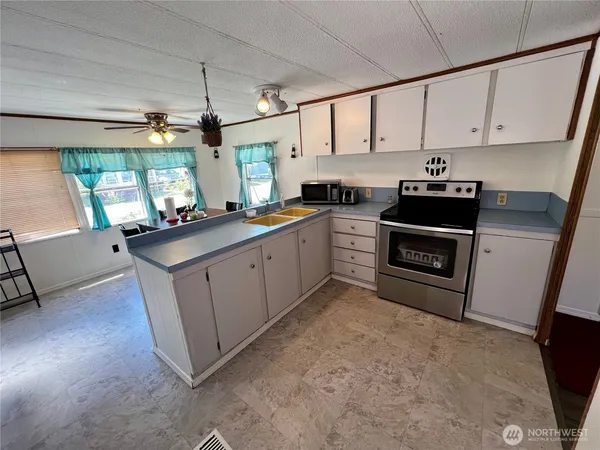 $59,000 | 8705 143rd Ave Court East, Unit 48, Puyallup, WA 98372