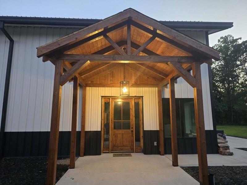 1590 4 Mile Church Road Ball Ground, GA 30107 - Photo 2 of 65 a front view of a house with shower