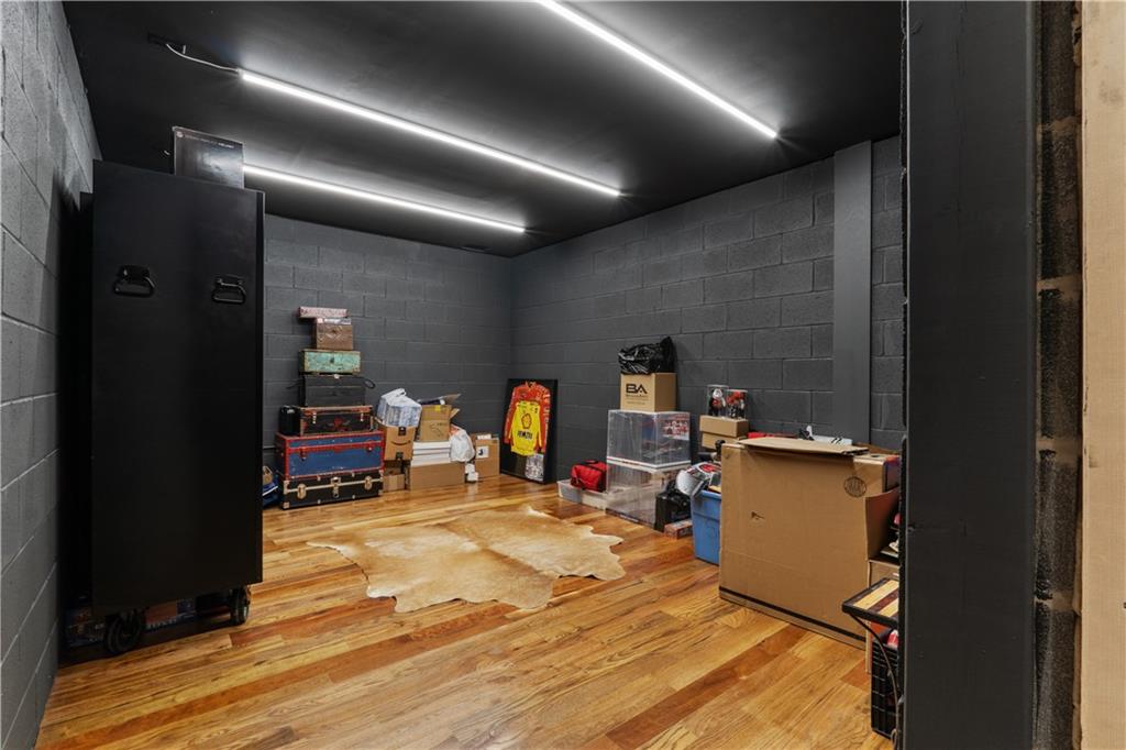 1590 4 Mile Church Road Ball Ground, GA 30107 - Photo 41 of 65 a view of a room with gym equipment