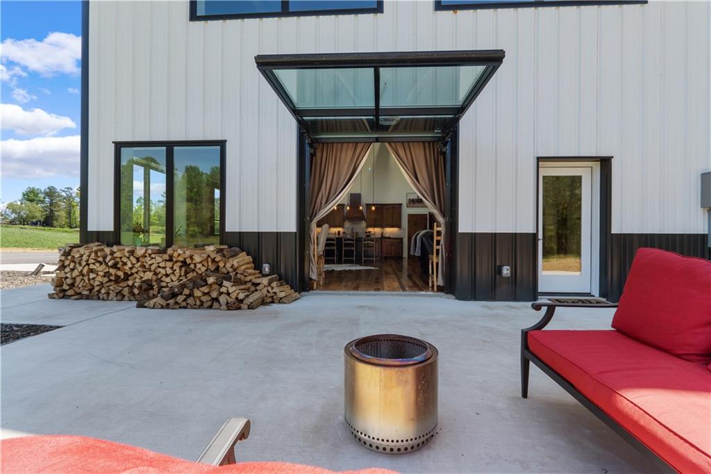 1590 4 Mile Church Road Ball Ground, GA 30107 - Photo 5 of 65 a living room with furniture and a couch