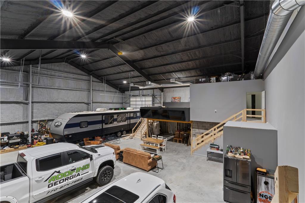 1590 4 Mile Church Road Ball Ground, GA 30107 - Photo 53 of 65 a view of storage and utility room