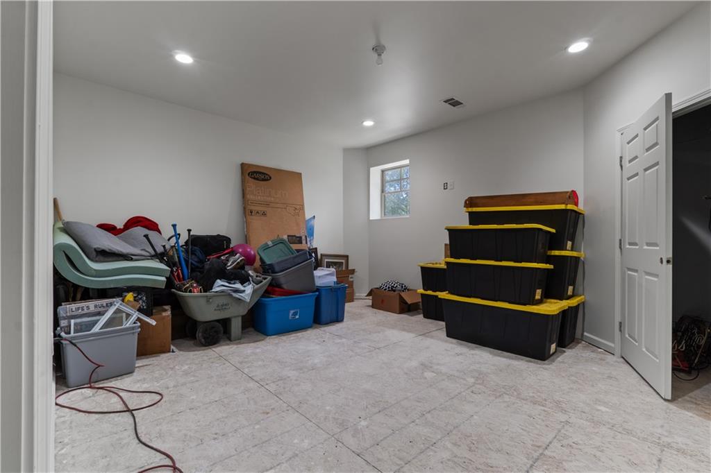 1590 4 Mile Church Road Ball Ground, GA 30107 - Photo 57 of 65 a living room with furniture