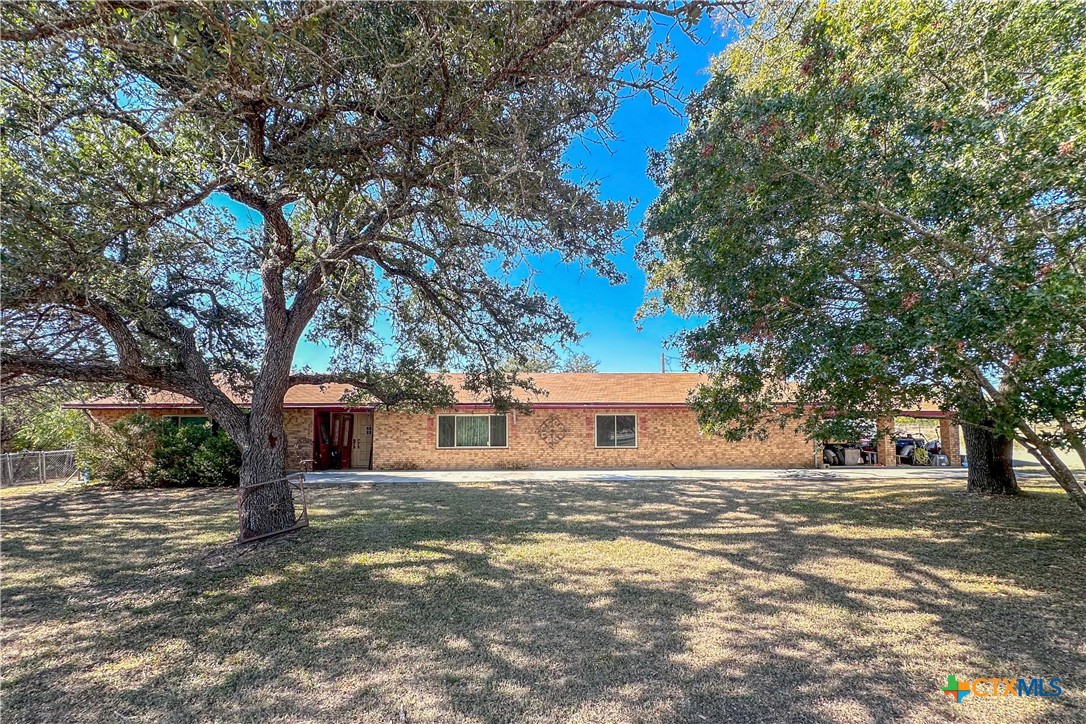 2736 Boys Ranch Road Kempner, TX 76539 - Photo 1 of 1 a front view of a house with a yard and trees