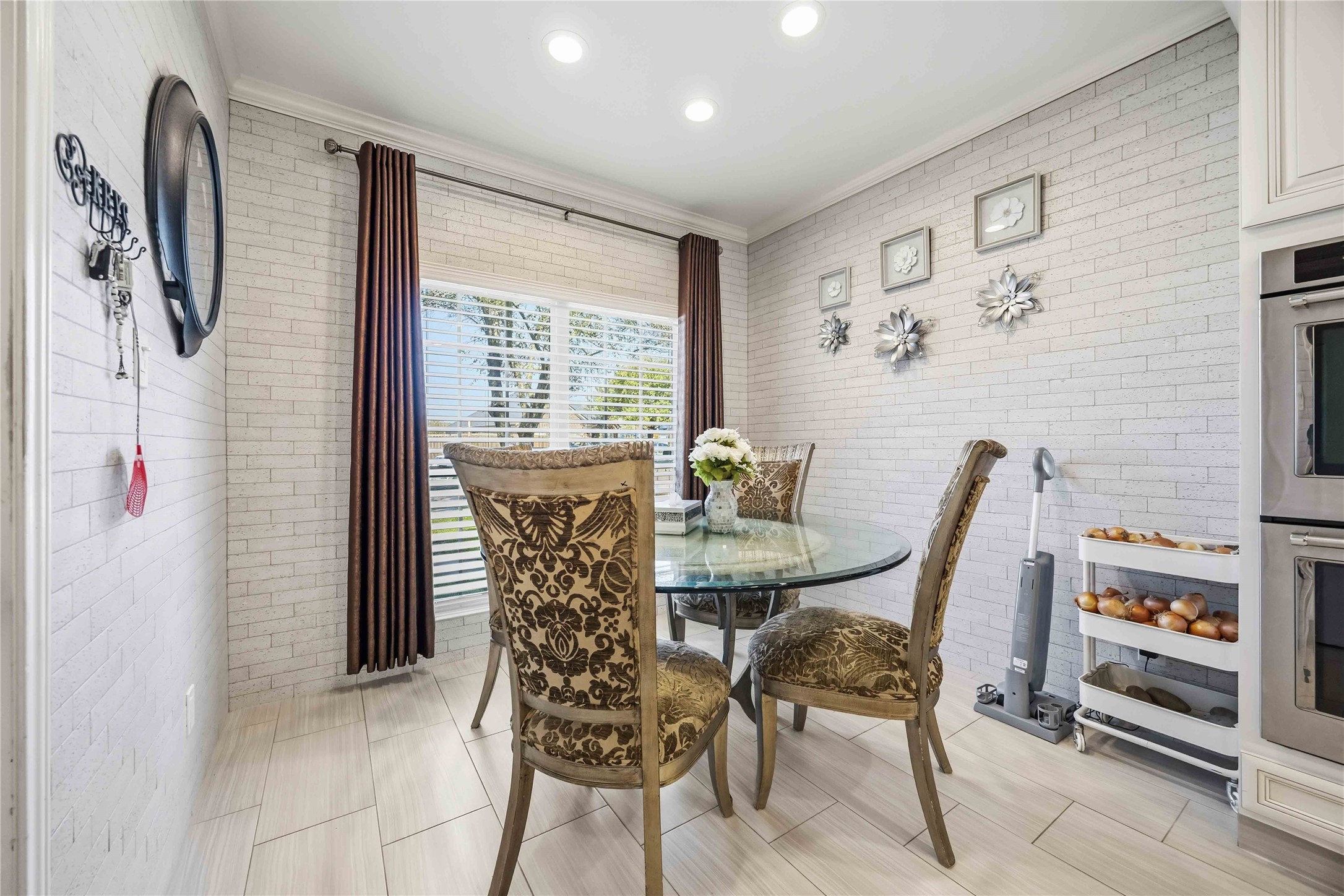19219 Brook Village Road Houston, TX 77084 - Photo 12 of 29 a dining room with furniture and window