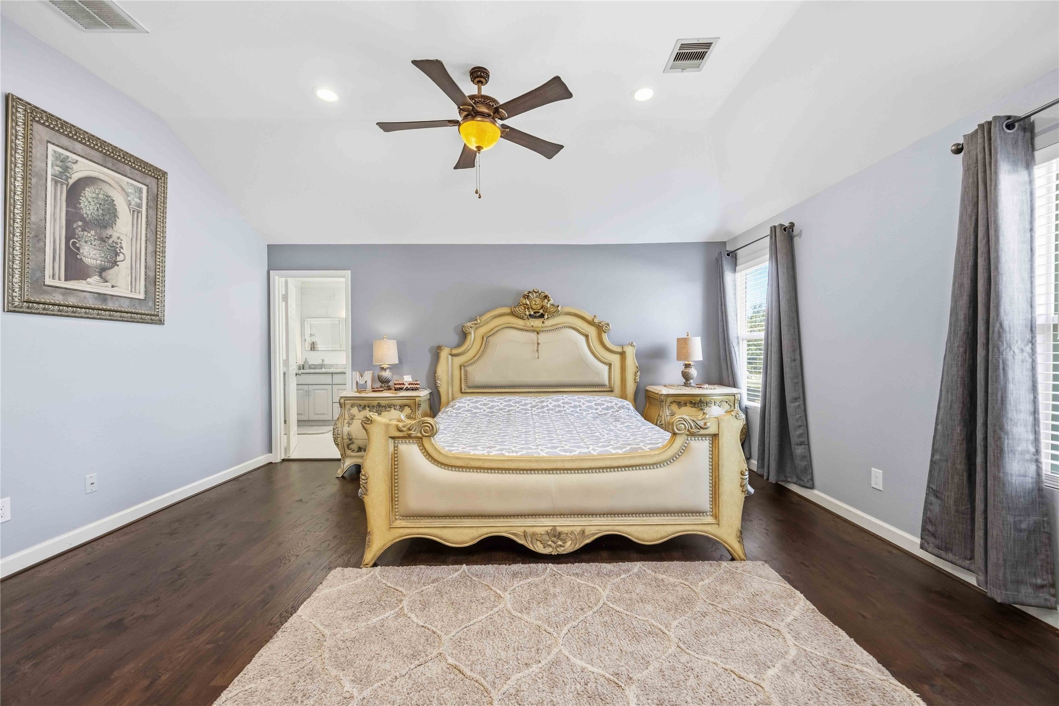 19219 Brook Village Road Houston, TX 77084 - Photo 25 of 29 a bedroom with a bed and a window