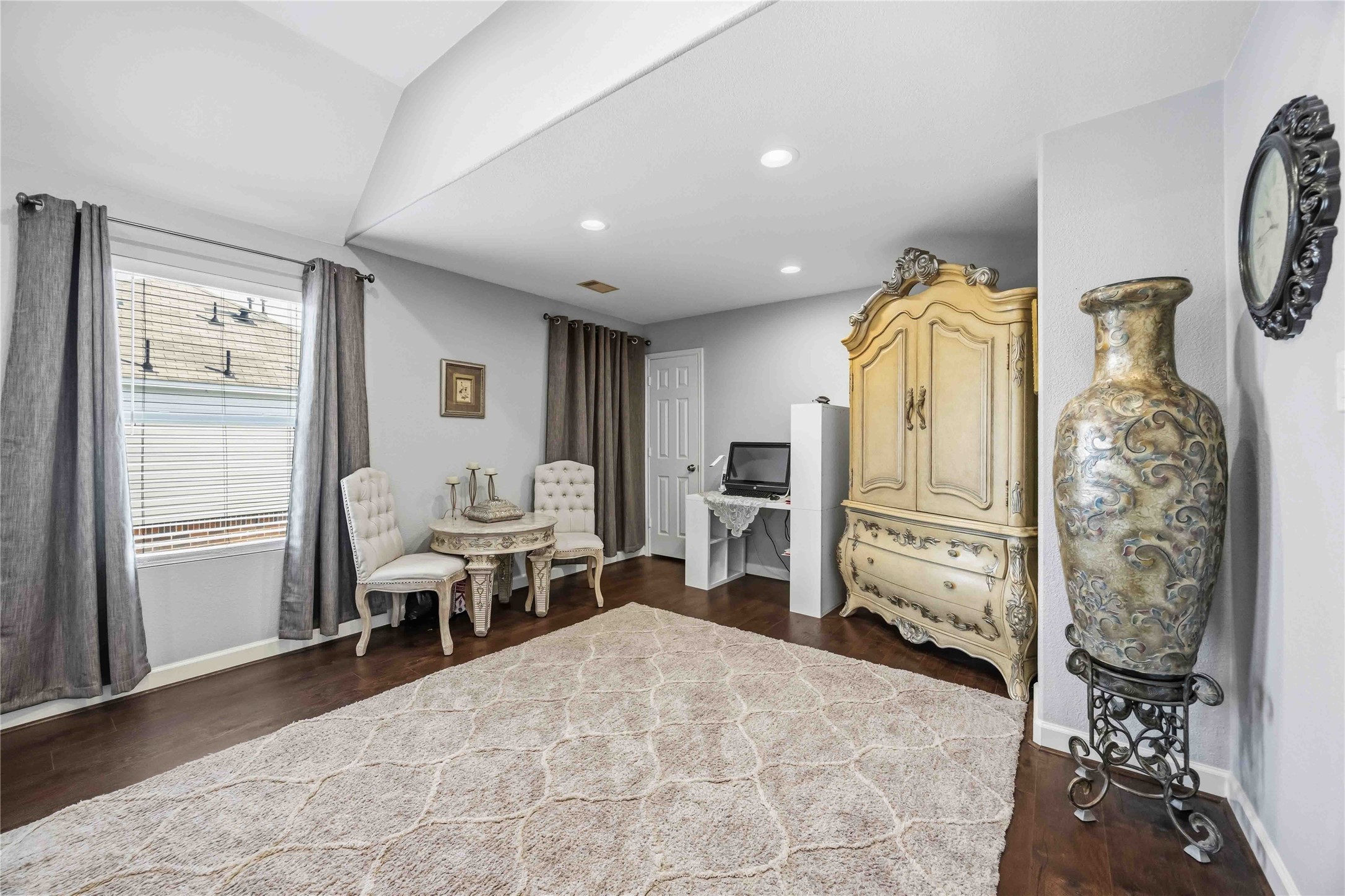 19219 Brook Village Road Houston, TX 77084 - Photo 26 of 29 a bedroom with furniture and a bed