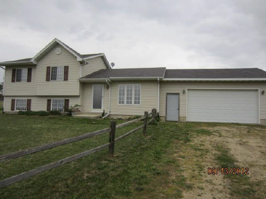 12951 Holverson Road Durand, IL 61024 - Photo 1 of 11 a house view with a garden space