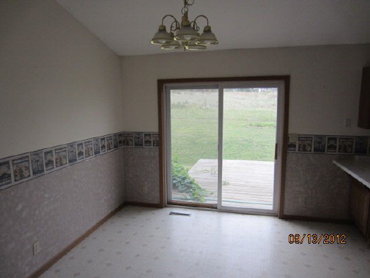 12951 Holverson Road Durand, IL 61024 - Photo 3 of 11 a view of a big room with windows