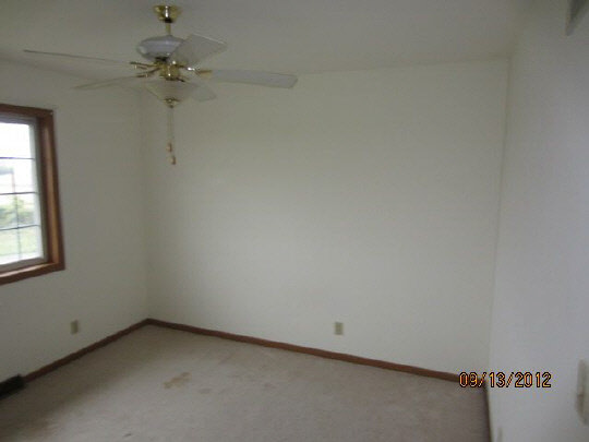 12951 Holverson Road Durand, IL 61024 - Photo 7 of 11 a view of a room that has a window in it