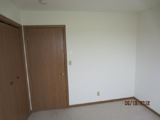 12951 Holverson Road Durand, IL 61024 - Photo 8 of 11 an empty room with closet