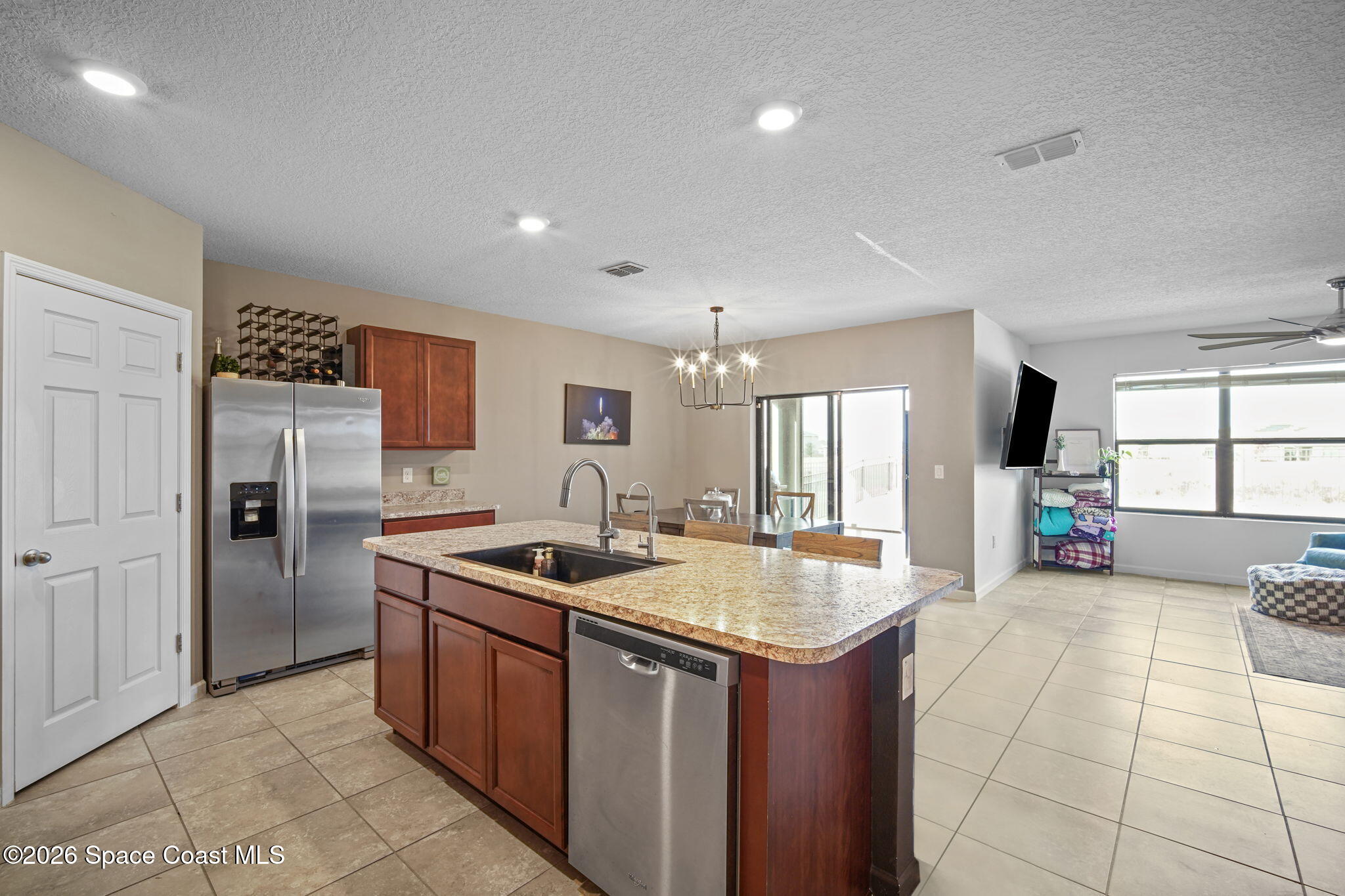 3818 Loggerhead Lane Mims, FL 32754 - Photo 7 of 30 7-web-or-mls-LOGGERHEAD_KITCHEN12 (2)