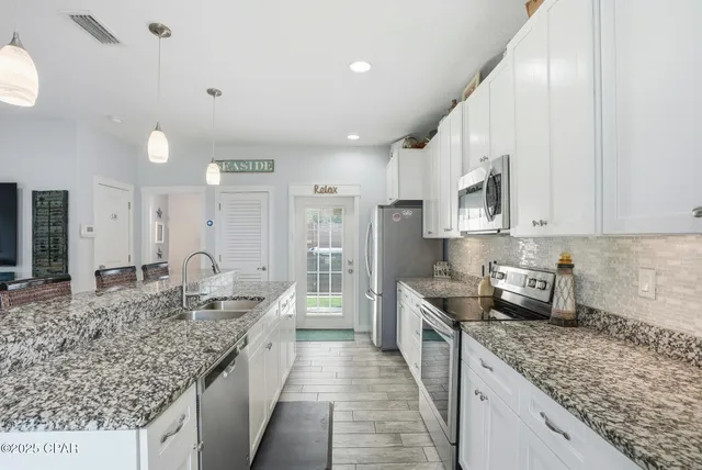 $910,000 | 208 Malaga Place, Panama City Beach, FL 32413