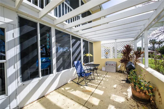 a view of balcony with furniture