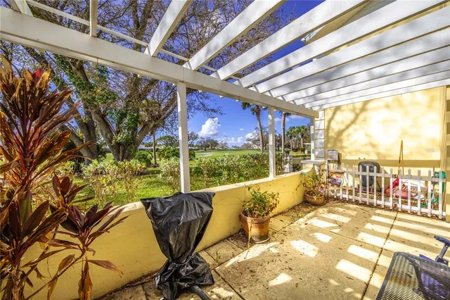 a view of a living room and balcony