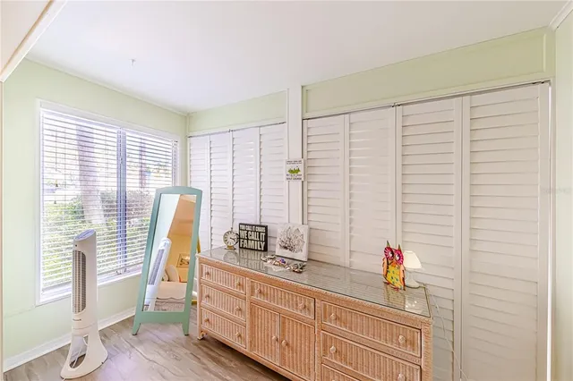 a bathroom with a tub and a window