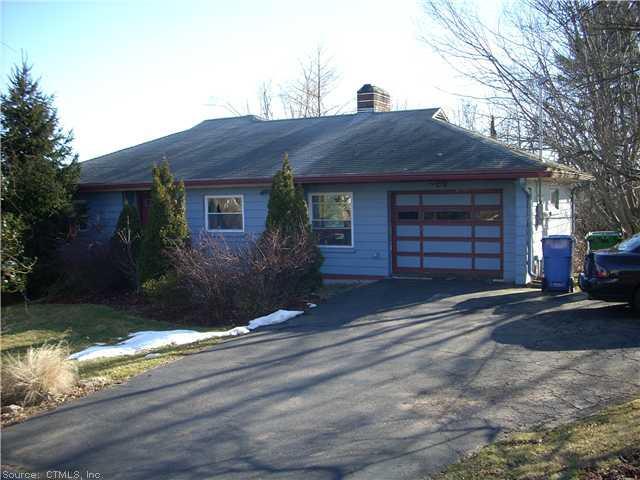 47 Timber Hill Road Cromwell, CT 06416 - Photo 1 of 1 a front view of a house with a yard