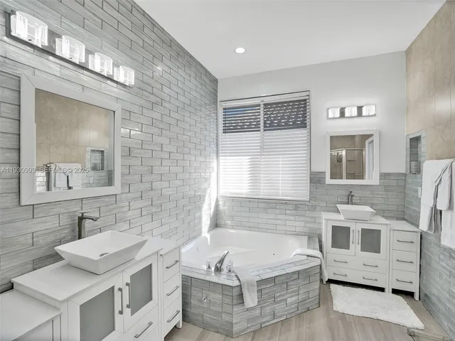 a bedroom with a bed and a table