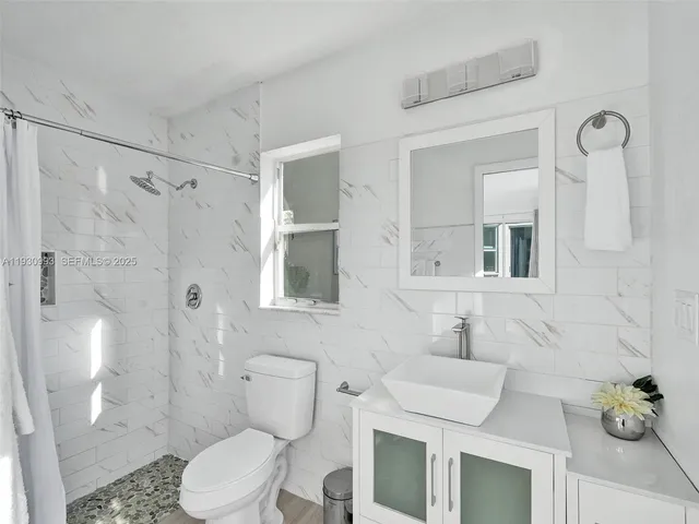 a view of a backyard with porch