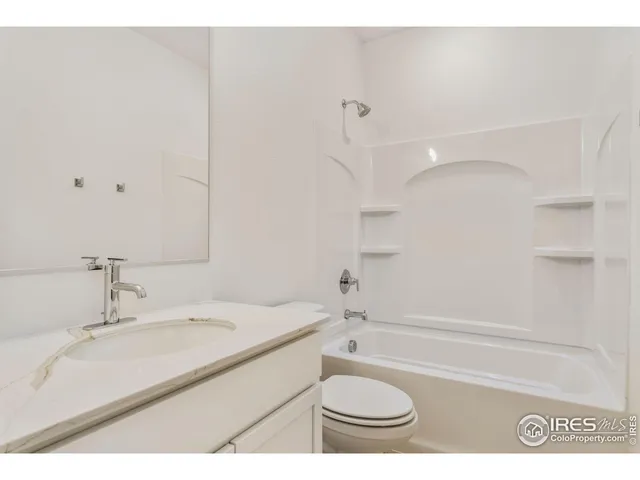 a bathroom with a sink a toilet and a bathtub