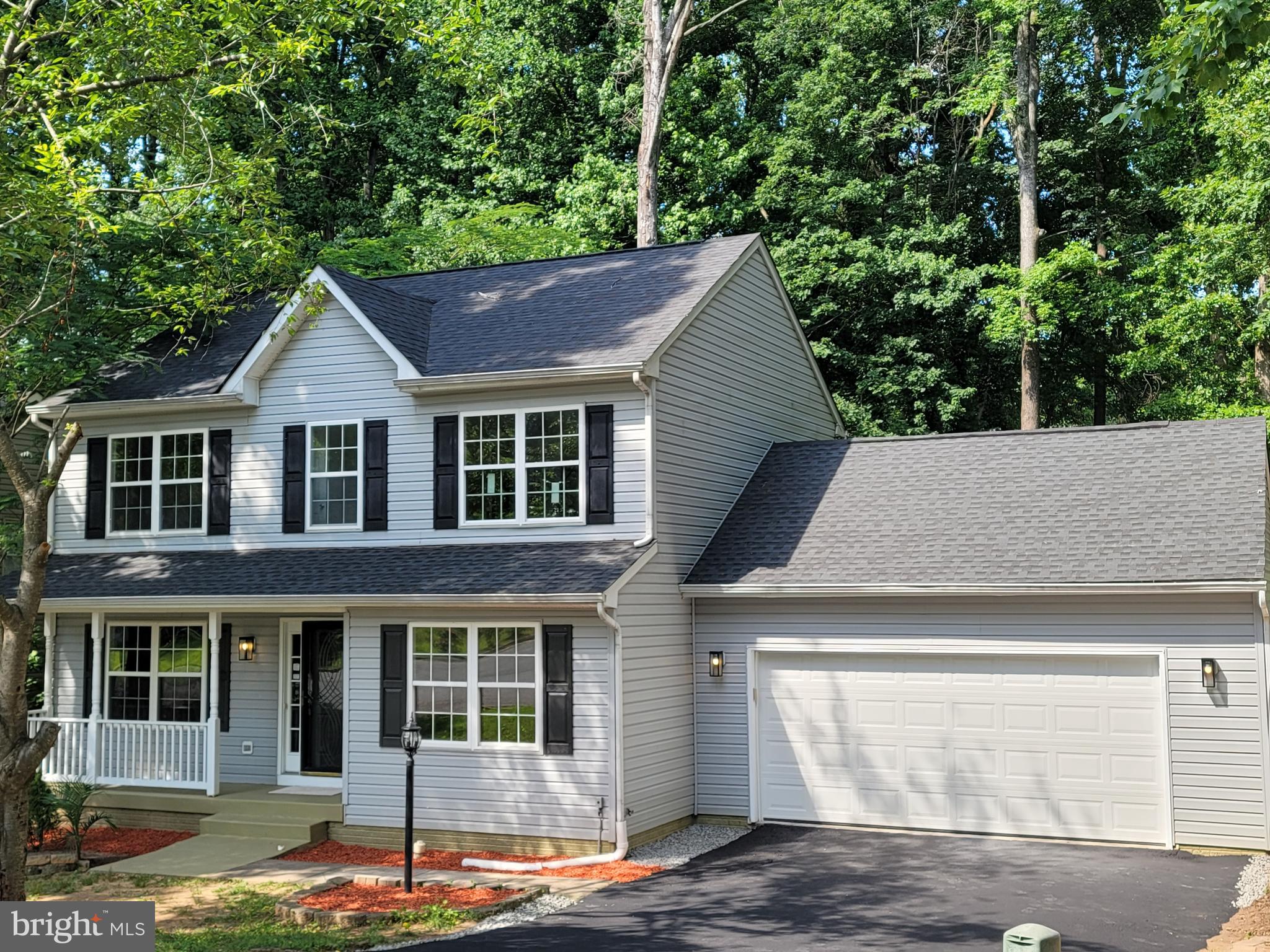 15 Lavelle Drive Fredericksburg, VA 22407 - Photo 1 of 45 a front view of a house with garden