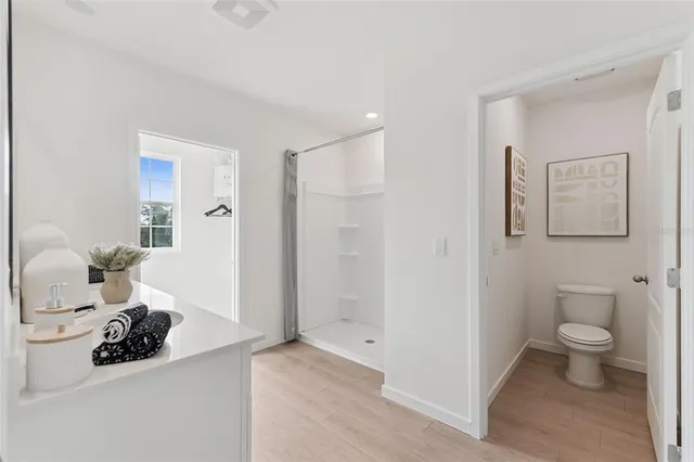 a bathroom with a double vanity sink and mirror