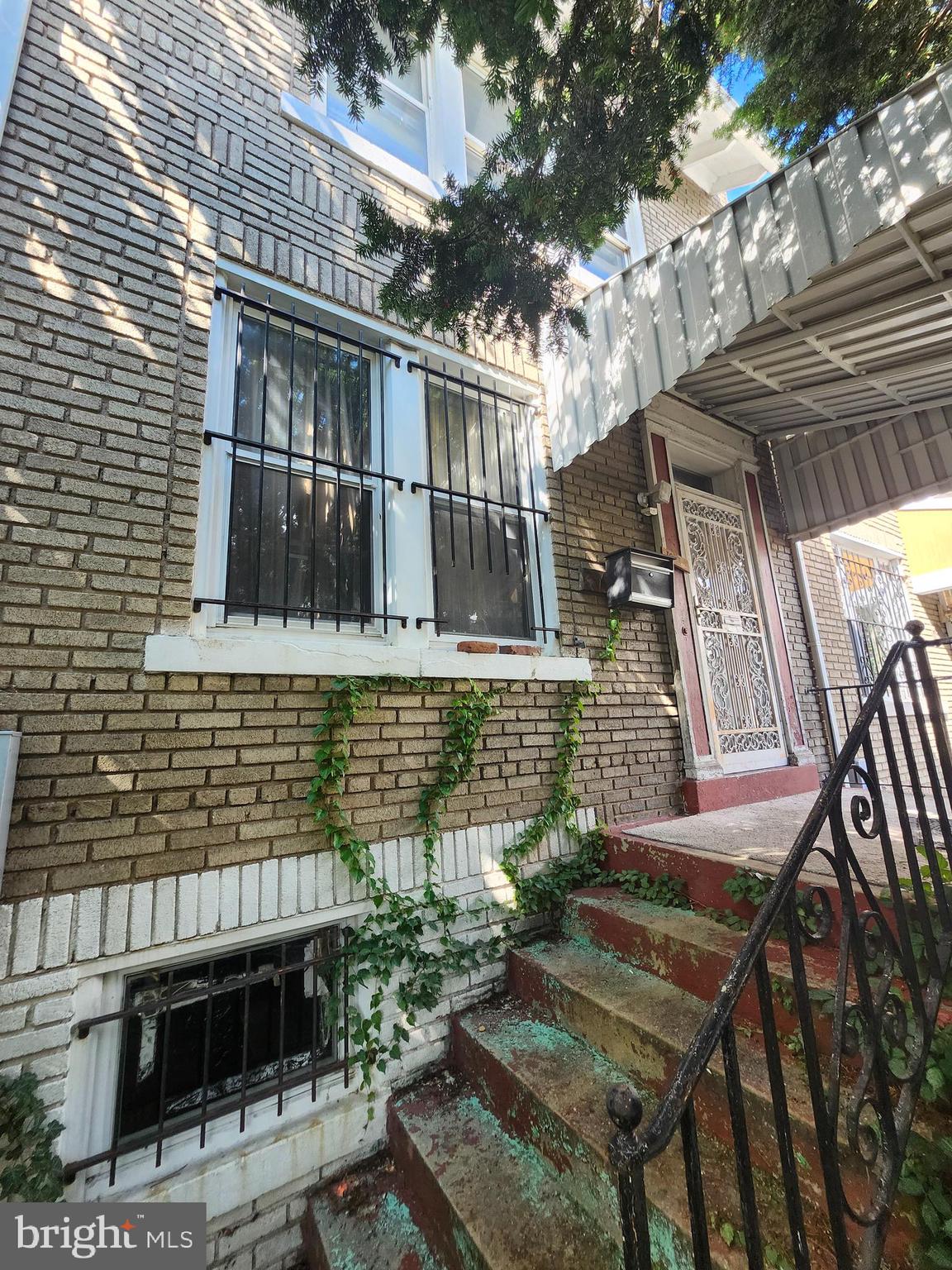 1011 Quebec Place Northwest Washington, DC 20010 - Photo 1 of 3 a front view of a house with balcony