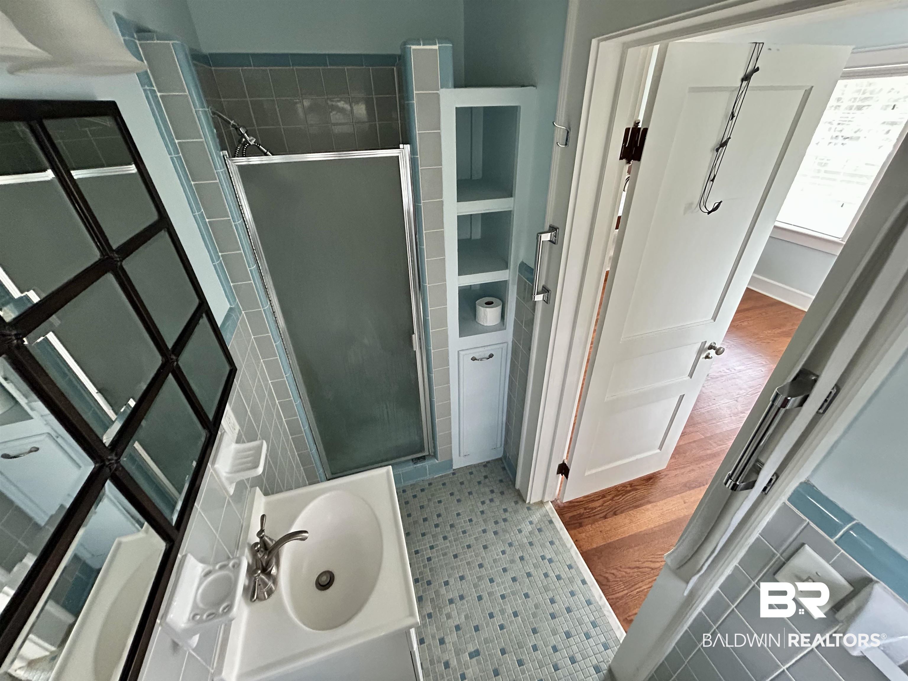 1405 Escambia Avenue Brewton, AL 36426 - Photo 14 of 16 Bathroom with a shower stall and vanity