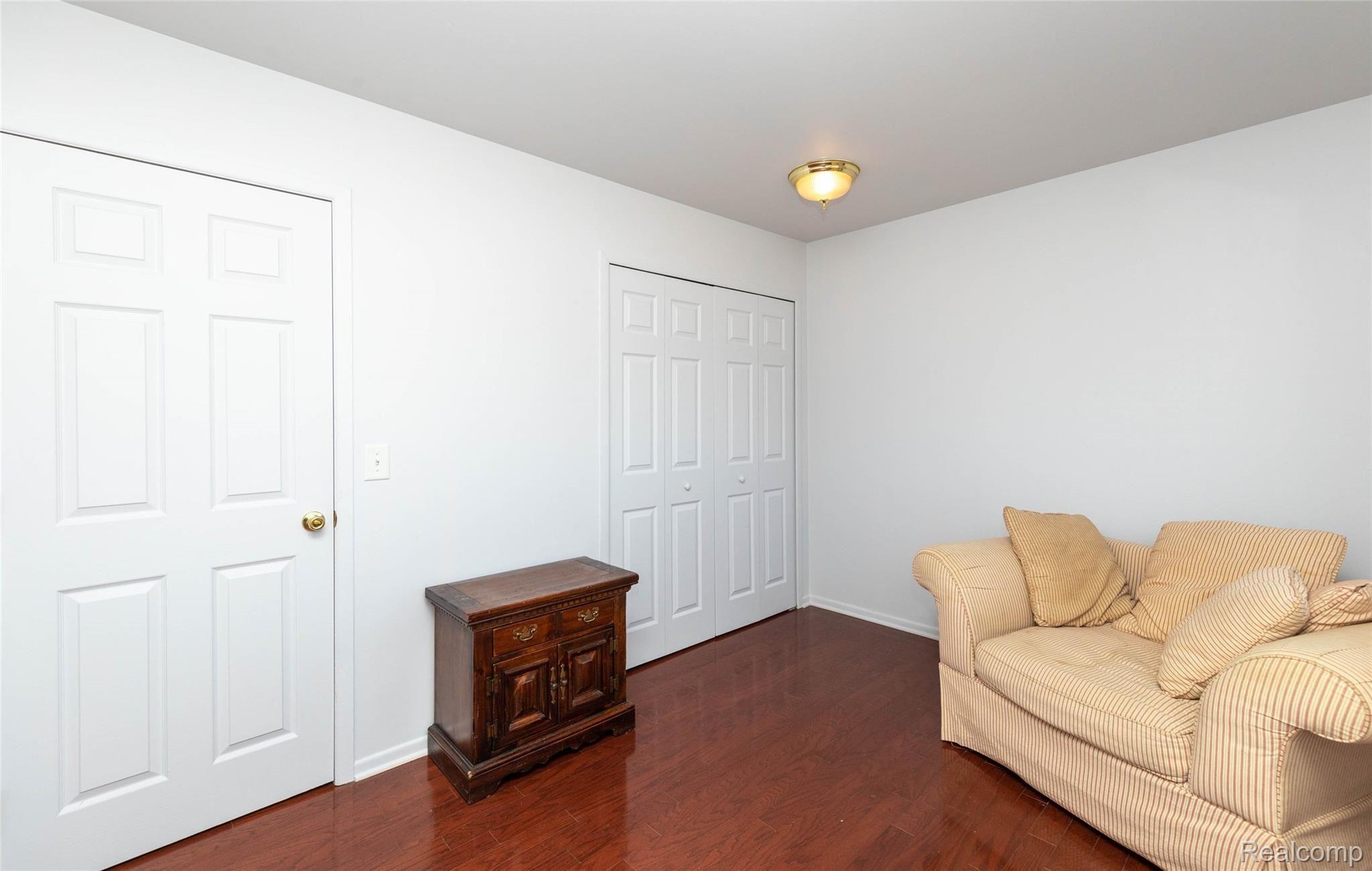 1095 Tienken Court, Unit 101 Rochester, MI 48306 - Photo 16 of 19 and a double closet