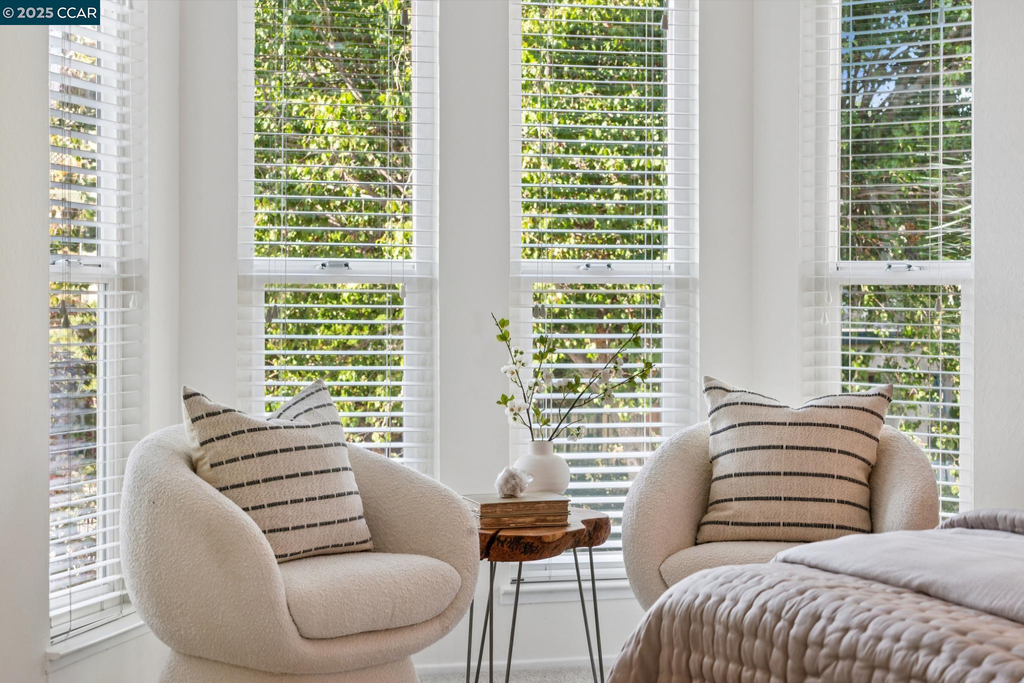 500 Vernon Street, Unit 102 Oakland, CA 94610 - Photo 18 of 43 a bedroom with furniture and a large window