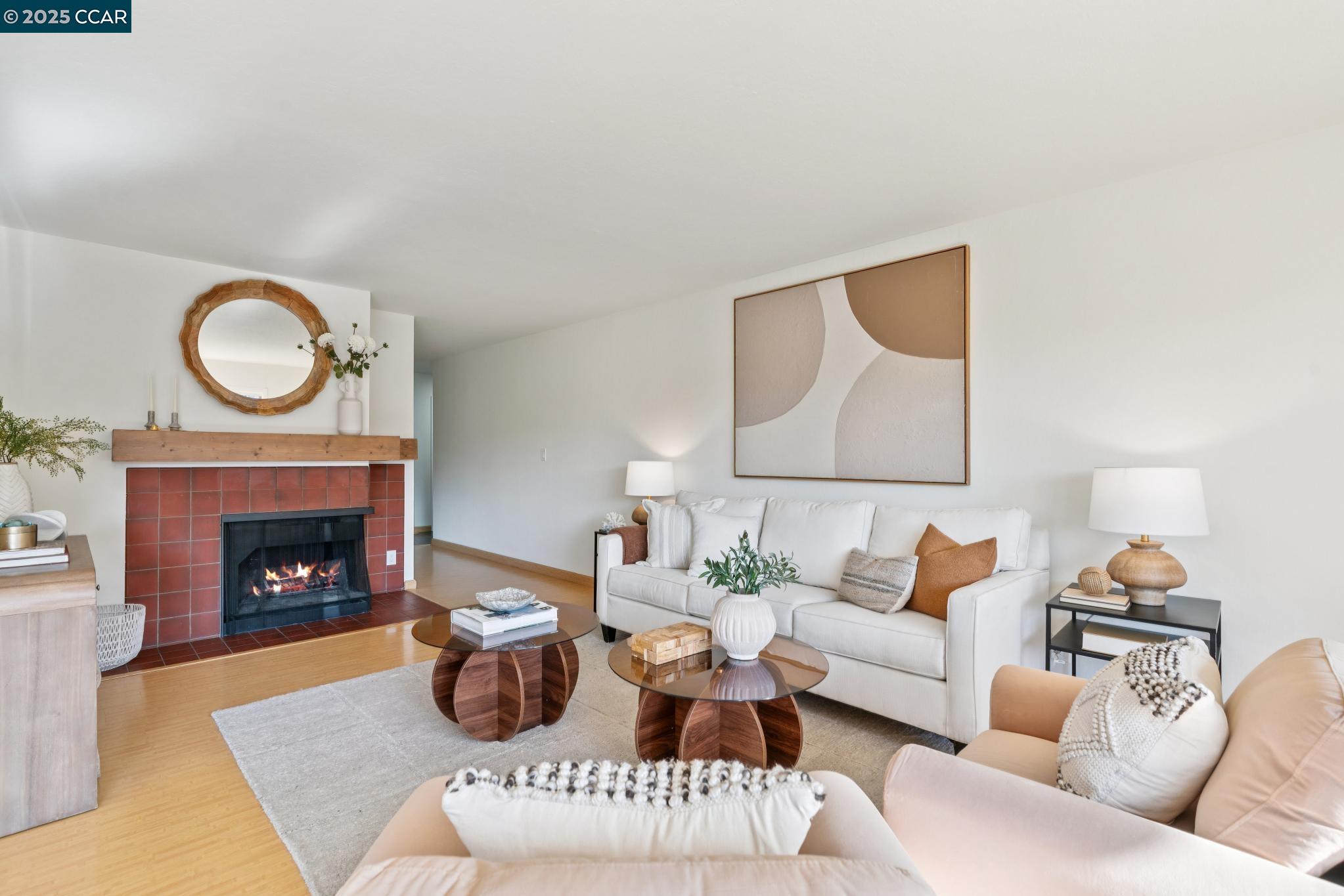 500 Vernon Street, Unit 102 Oakland, CA 94610 - Photo 5 of 43 a living room with furniture and a fireplace