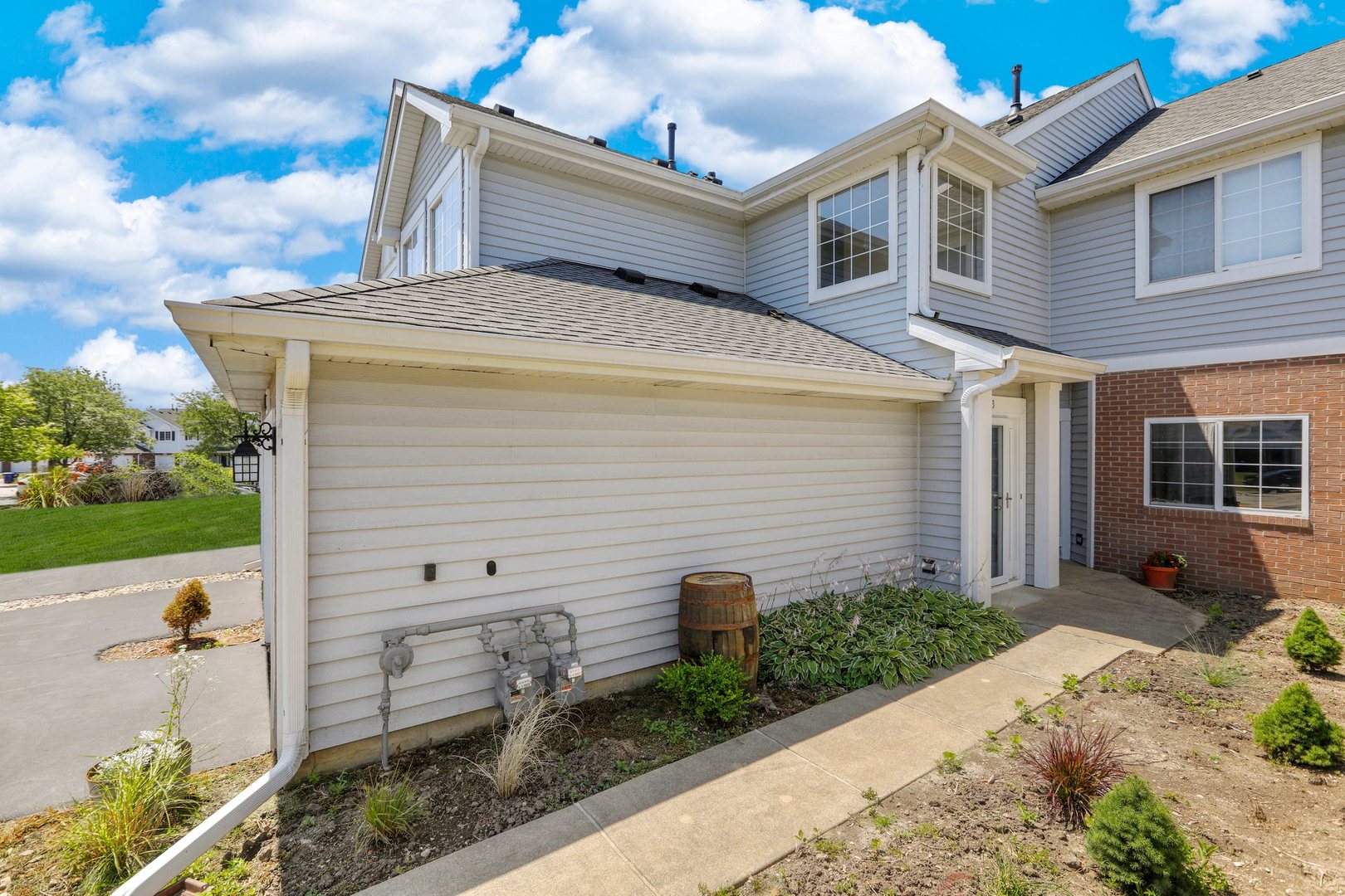 8171 Ripple Ridge Darien, IL 60561 - Photo 2 of 25 a view of a house with a yard