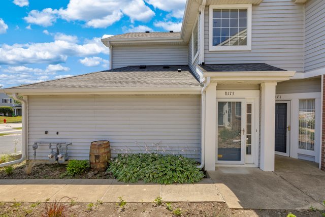 8171 Ripple Ridge Darien, IL 60561 - Photo 3 of 25 a view of front door of house