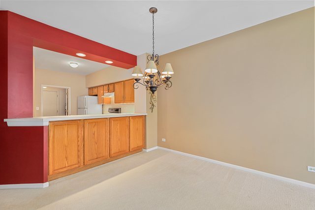 8171 Ripple Ridge Darien, IL 60561 - Photo 10 of 25 a view of a kitchen with a sink