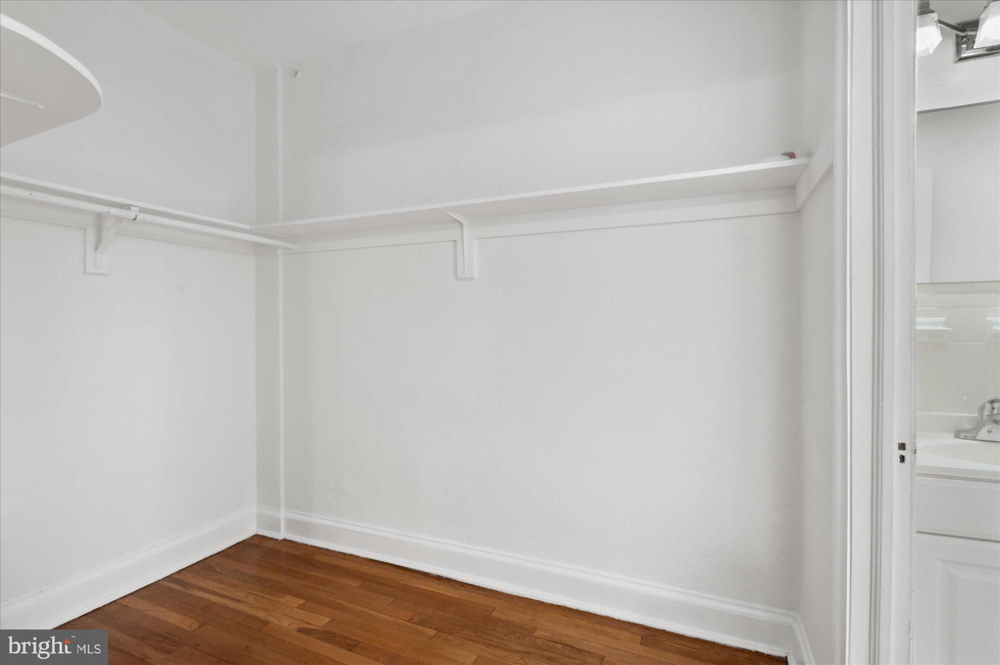2032 Belmont Road Northwest, Unit 603 Washington, DC 20009 - Photo 12 of 16 a view of an empty walk in closet