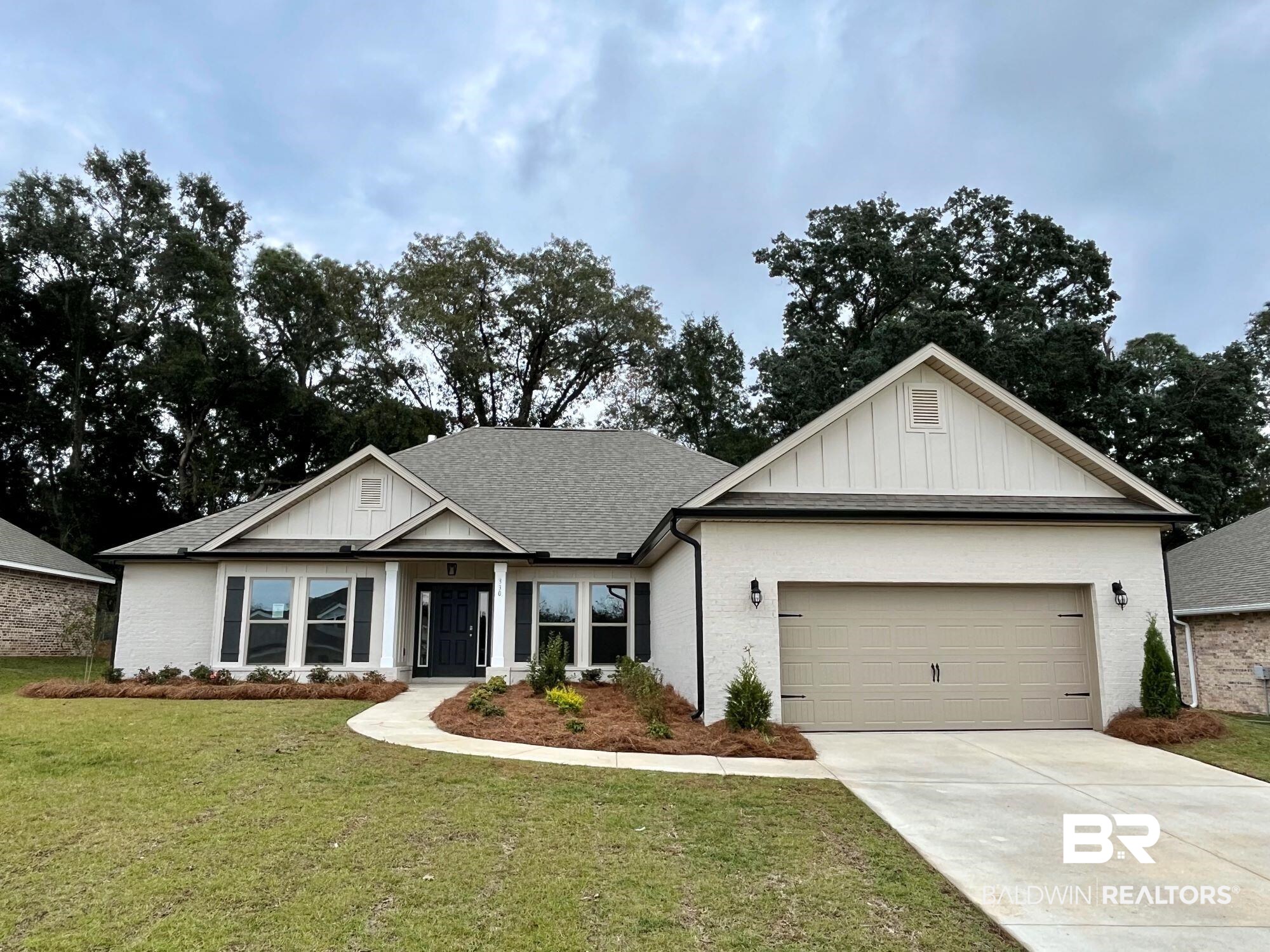 330 Barndling Street Fairhope, AL 36532 - Photo 1 of 31 Craftsman inspired home with a garage and a front lawn