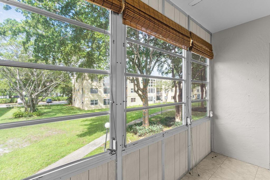 351 Cambridge Road, Unit 208 Hollywood, FL 33024 - Photo 21 of 35 a view of outdoor space with swimming pool