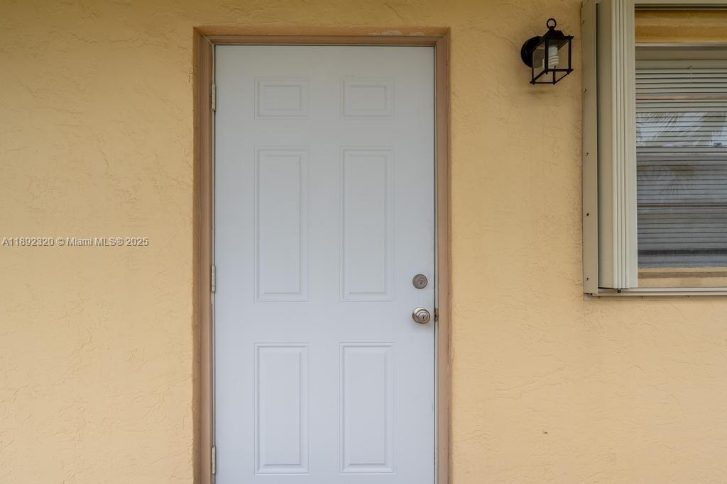 351 Cambridge Road, Unit 208 Hollywood, FL 33024 - Photo 29 of 35 a bathroom with a shower