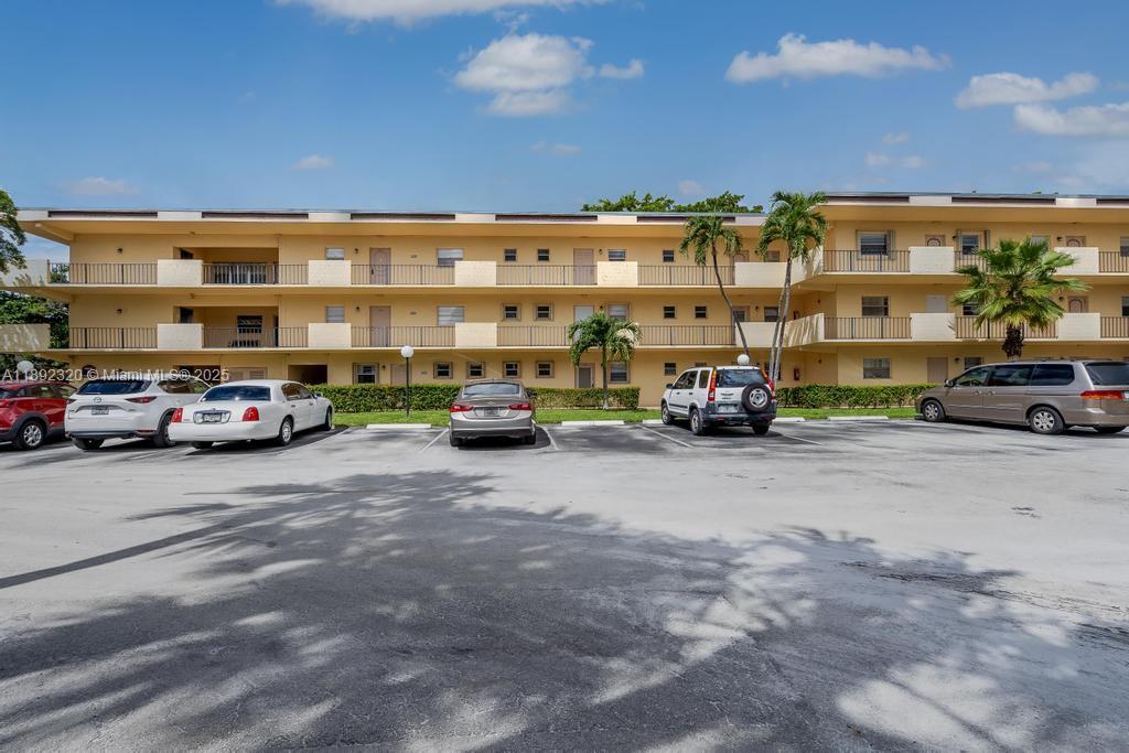 351 Cambridge Road, Unit 208 Hollywood, FL 33024 - Photo 5 of 35 a view of parking space and parking