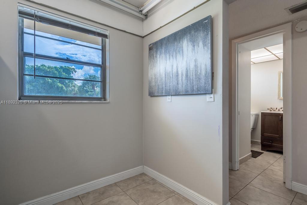 351 Cambridge Road, Unit 208 Hollywood, FL 33024 - Photo 9 of 35 a view of empty room