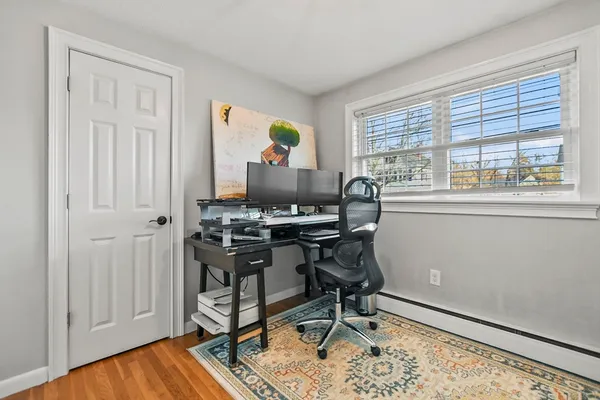 a workspace with wooden floor