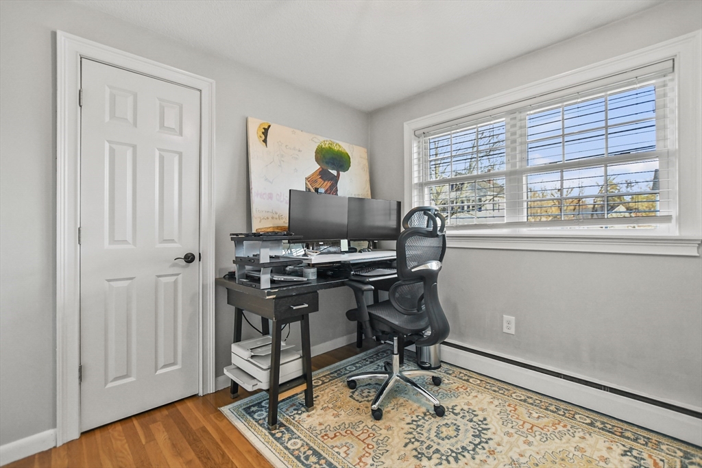 118 1/2 Market Street, Unit 118 1/2 Amesbury, MA 01913 - Photo 15 of 37 a workspace with wooden floor