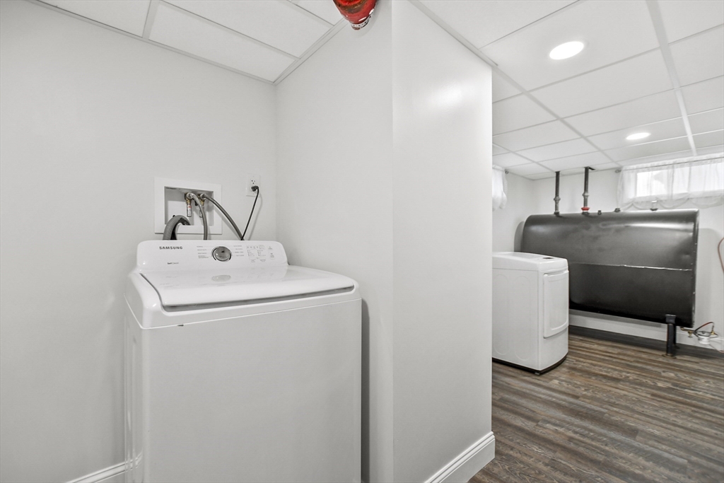 118 1/2 Market Street, Unit 118 1/2 Amesbury, MA 01913 - Photo 25 of 37 a utility room with washer and dryer