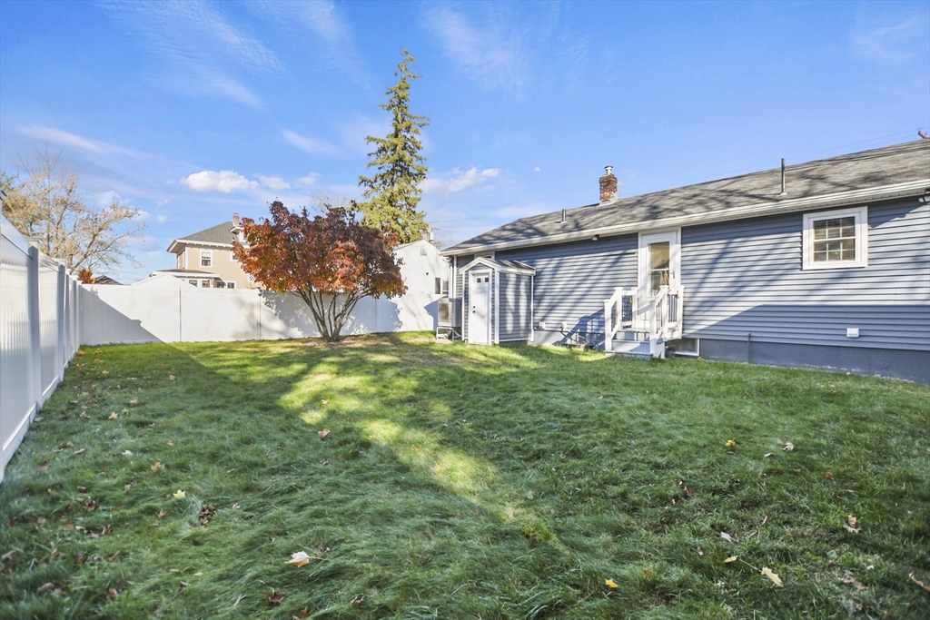 118 1/2 Market Street, Unit 118 1/2 Amesbury, MA 01913 - Photo 27 of 37 a view of a house with a yard