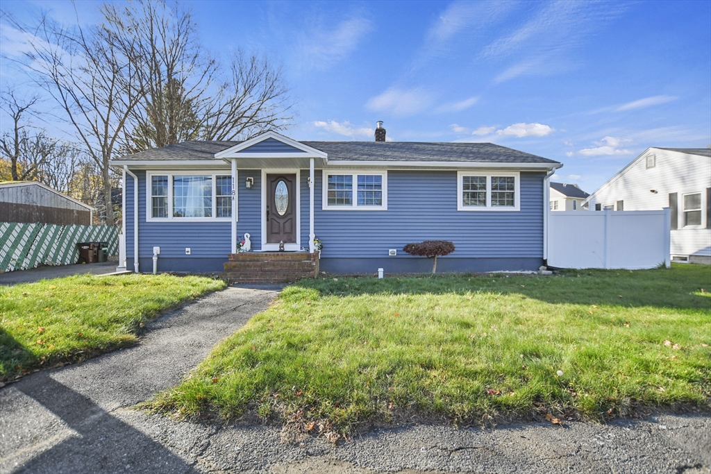 118 1/2 Market Street, Unit 118 1/2 Amesbury, MA 01913 - Photo 33 of 37 a front view of a house with garden