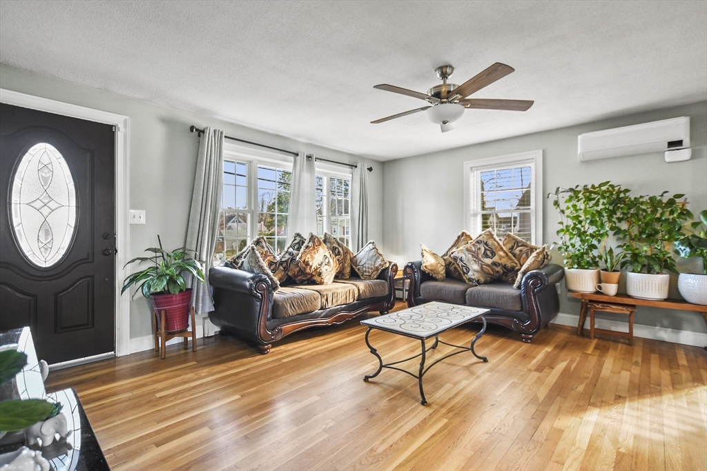 118 1/2 Market Street, Unit 118 1/2 Amesbury, MA 01913 - Photo 4 of 37 a living room with furniture and a window
