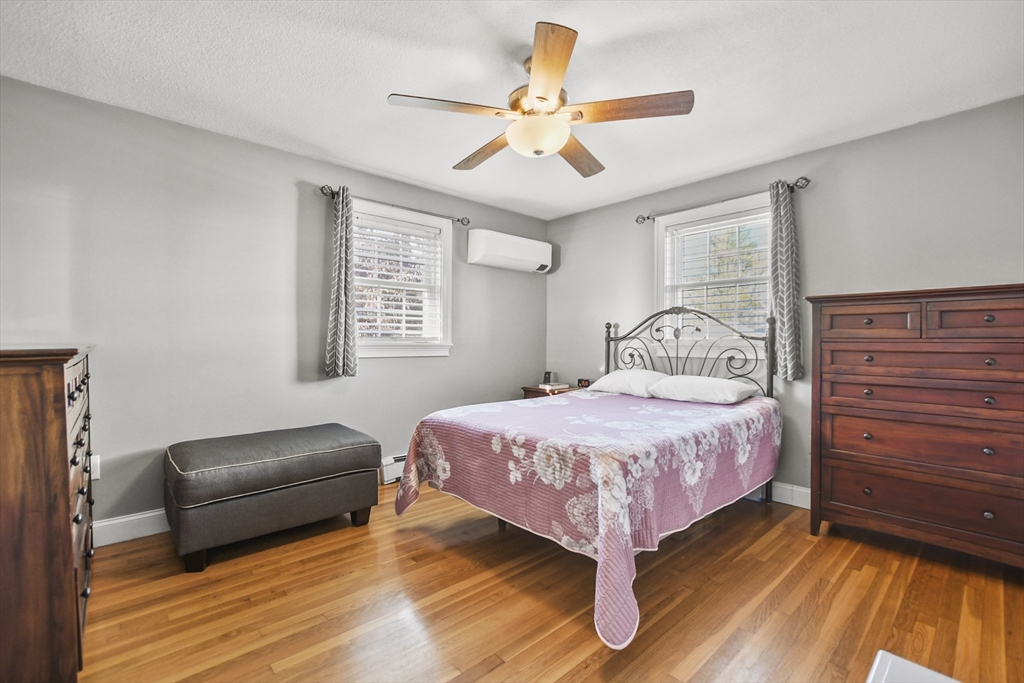 118 1/2 Market Street, Unit 118 1/2 Amesbury, MA 01913 - Photo 9 of 37 a bedroom with a bed and window