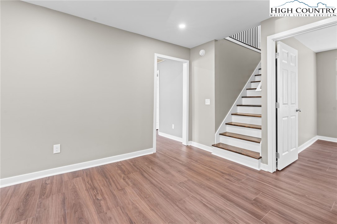 2015 Highway 194 Boone, NC 28607 - Photo 18 of 40 a view of a hallway with wooden floor and entryway