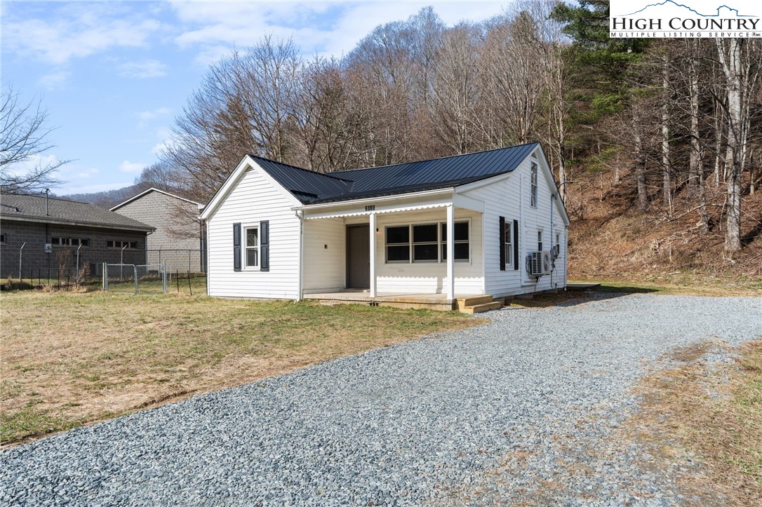 2015 Highway 194 Boone, NC 28607 - Photo 32 of 40 a front view of a house with a garden